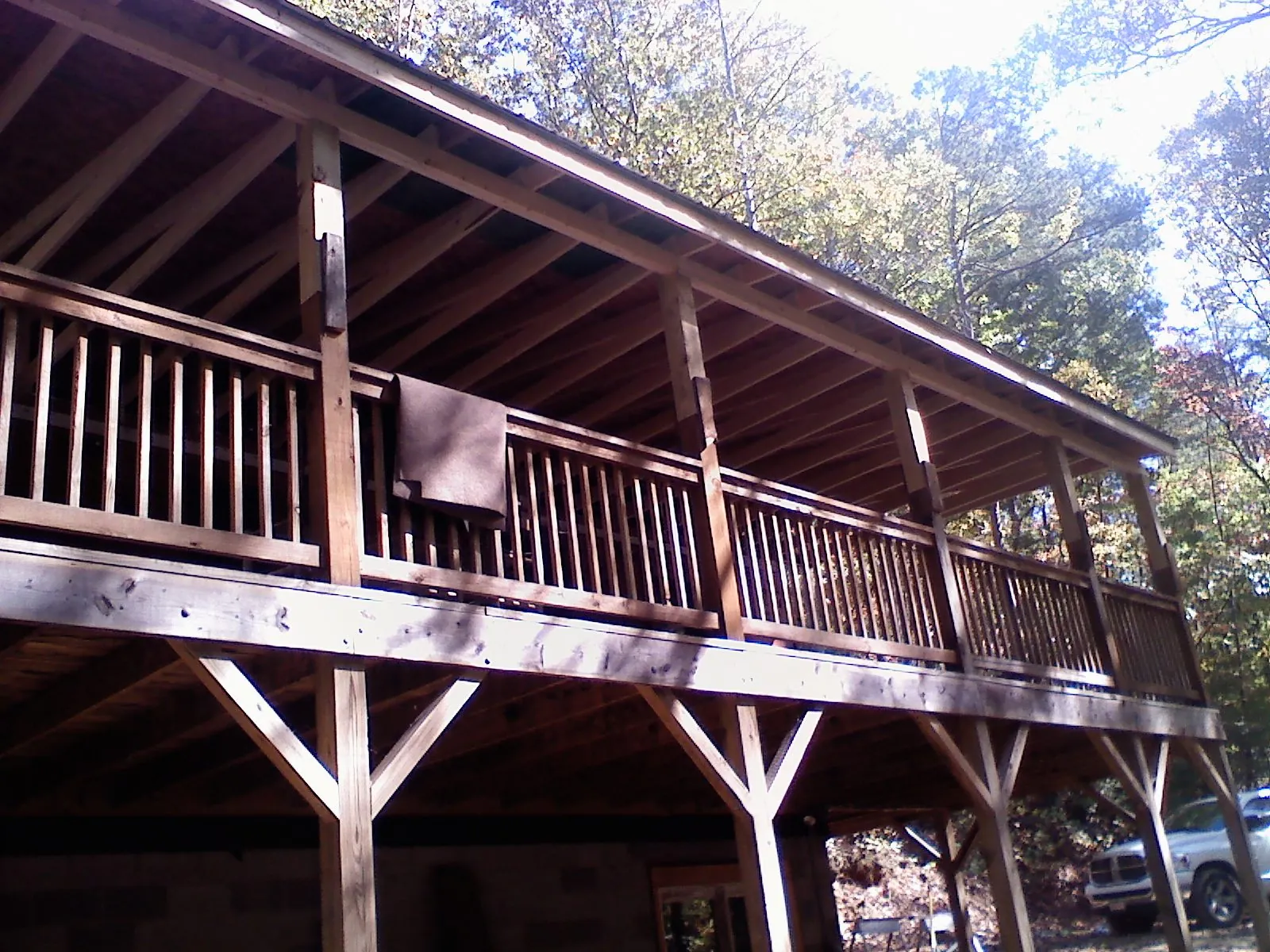 Timber framing under a new elevated porch and deck — Roof Leak Repair in Elkins by Roofing Brothers